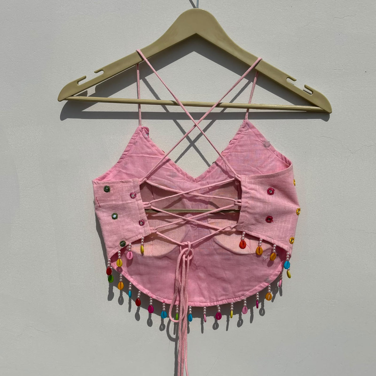 Navratri Baby Pink Mirror Embroidery With Colorful Shells Criss Cross Padded top - KJ10472
